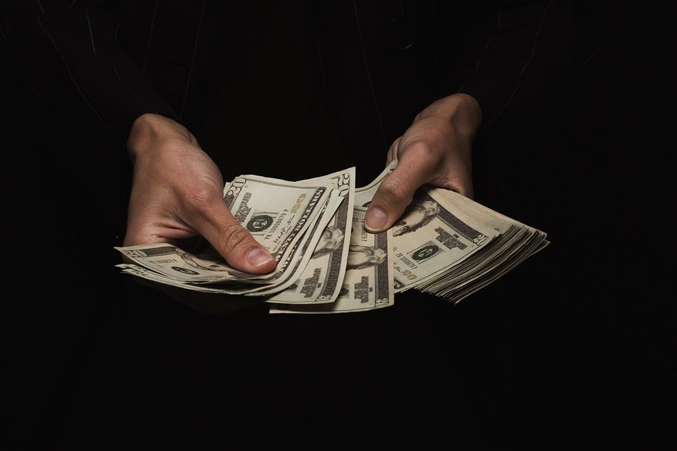 person counting money