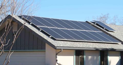 home with solar panels on roof